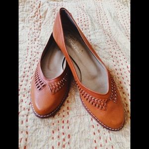 Brown leather flats